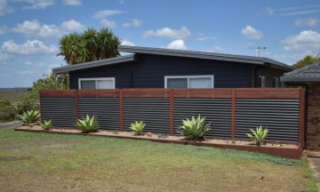 Winner Innovation and Excellence in COLORBOND® steel Fencing - Custom Orb with Australian Hardwood project by Northern Rivers Fencing